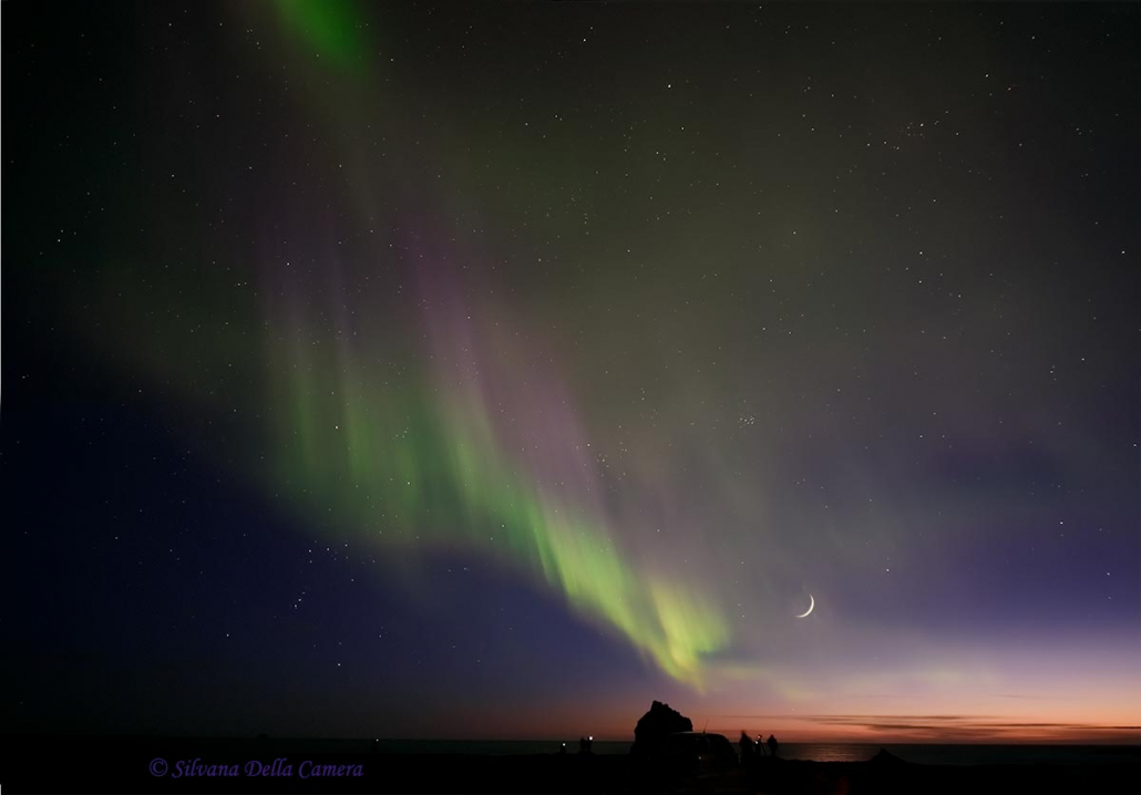 A photograph of the aurora borealis over Iceland.